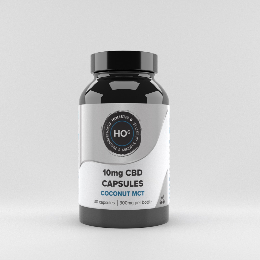 Photoreal render of a Holistic6 10mg CBD capsule tub: black lid, grey and white label, on a soft grey studio floor